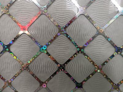 Vidro impresso revestido com titânio