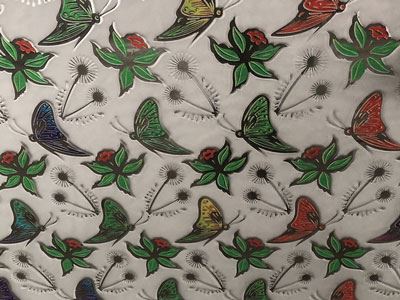 Vidro impresso revestido com titânio